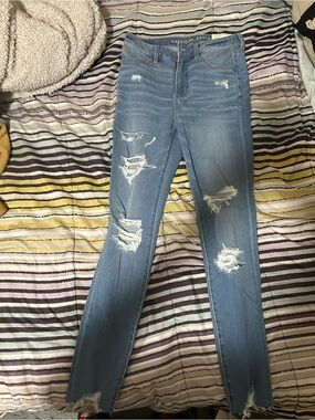 American Eagle Outfitters Medium Blue Ripped Skinny Jeans